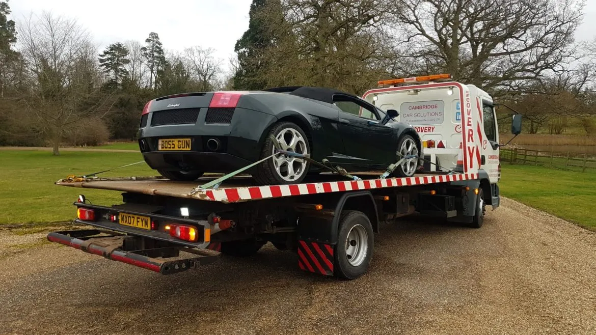 car being towed in AB